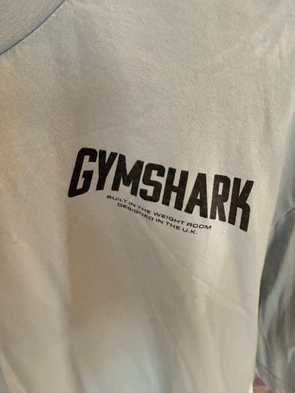 Gymshark Men’s Pale Blue Short Sleeve Tee with Black Logo